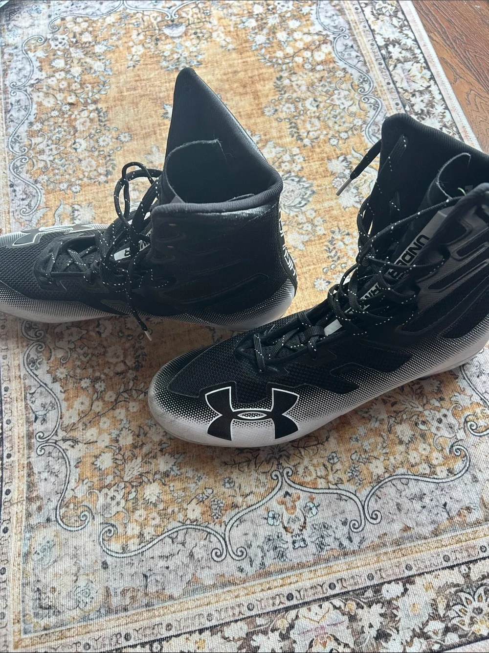 Under Armour Black and Silver High-Top Athletic cleats